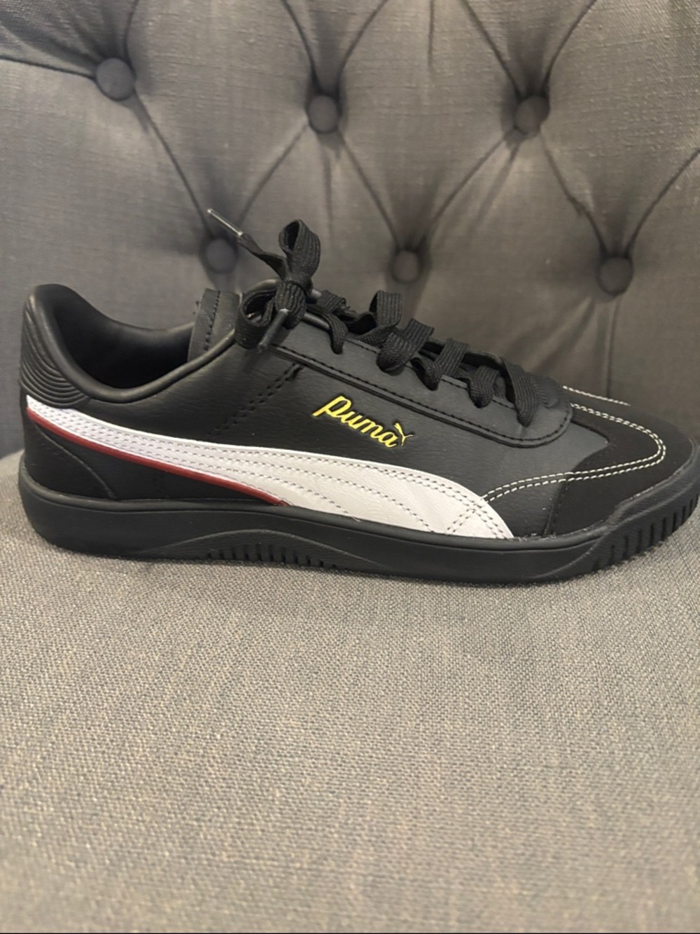Puma womens Black Sneakers with White Formstrip and Red Accent